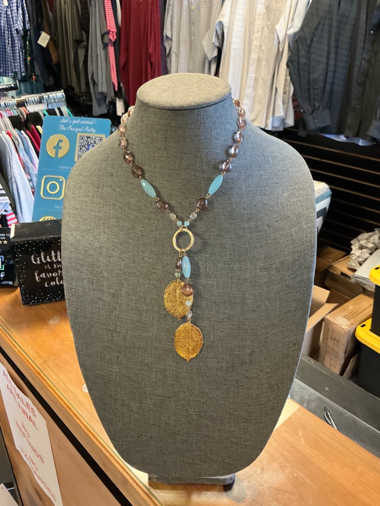 Necklace - Mixed colors (including brown, light blue, and gold) -